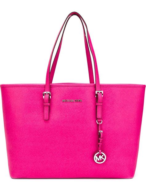 set travel michael kors|Michael Kors pink suitcase.